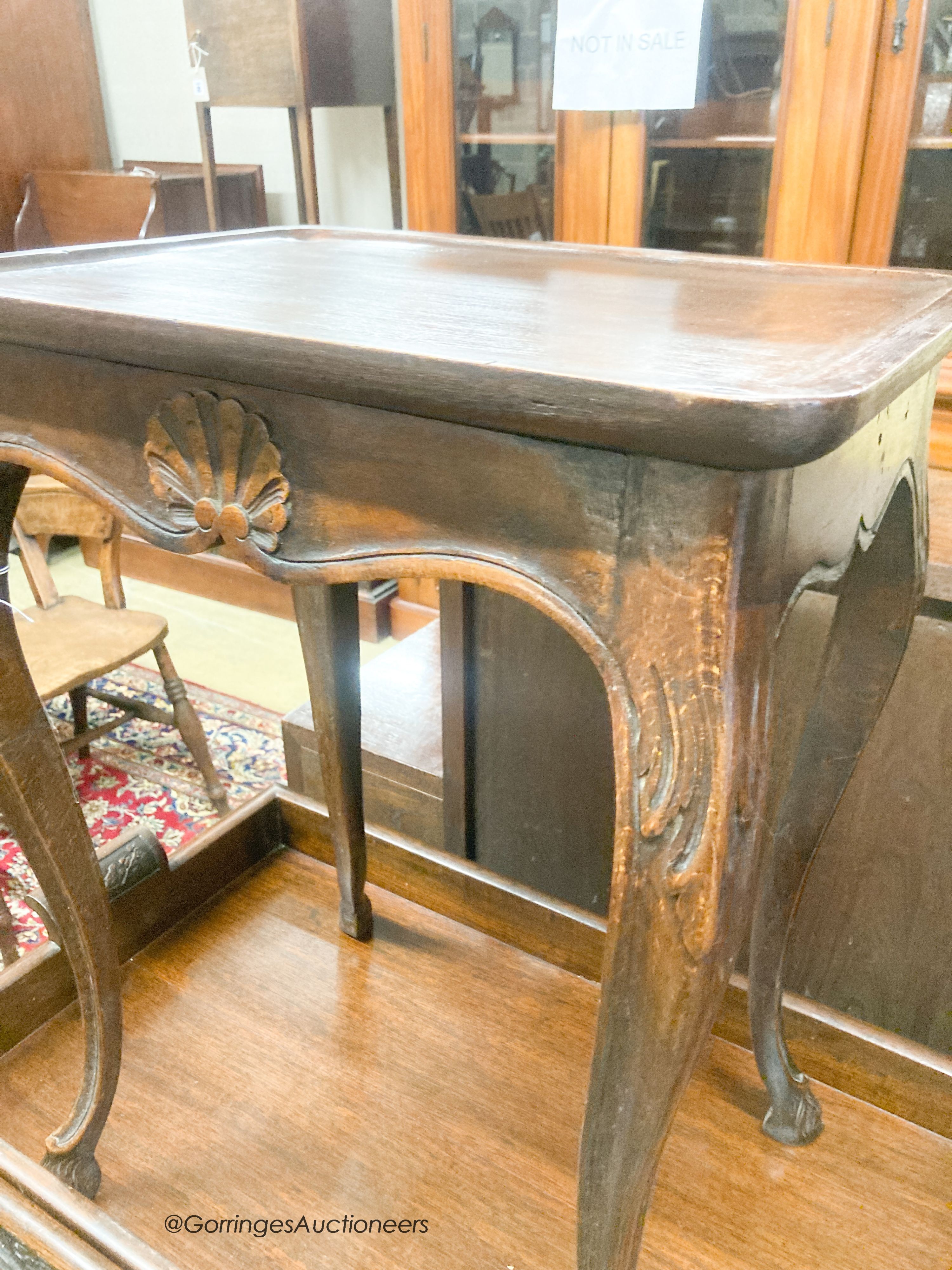 A French oak cabriole leg table, width 45cm, depth 32cm, height 59cm